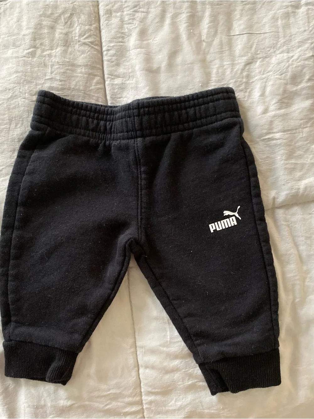 Calvin Klein Navy & White Striped Baby Onesie with Mixed Neutral Baby Clothing